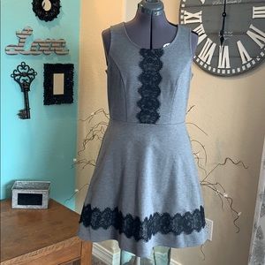 Grey dress w/ black lace detail.
